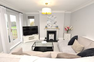 Living Room pic2- click for photo gallery